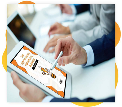 Businessman looking at a tablet’s display, scrolling BizzBee’s B2B Outbound Copywriting ebook.